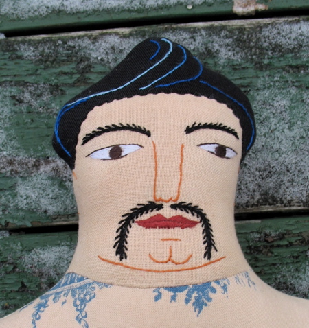 124tattoomanface.jpg